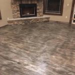 Floors that look like grey wood flooring but are concrete